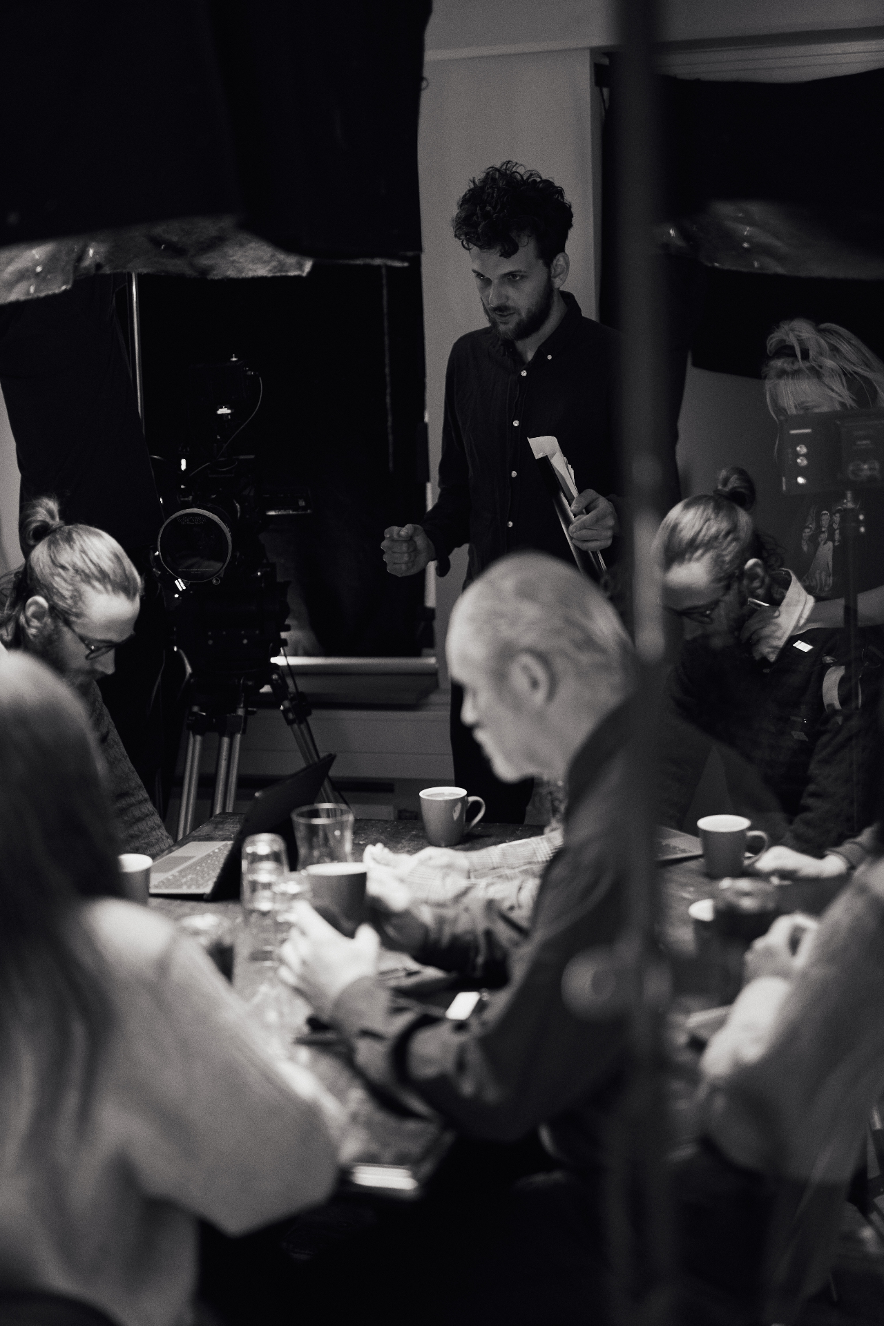 Director Alessandro Stigliano on set with the crew