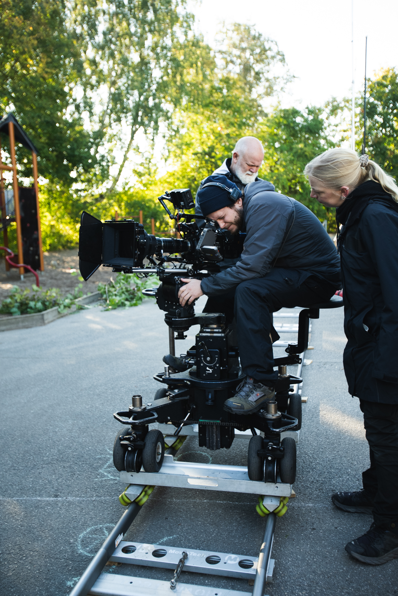 Ahoogafilm crew on a dolly track during a production